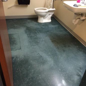 Restroom tile before image